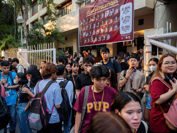 Students evacuate following an earthquake, in Manila, Philippines, December 5, 2023.